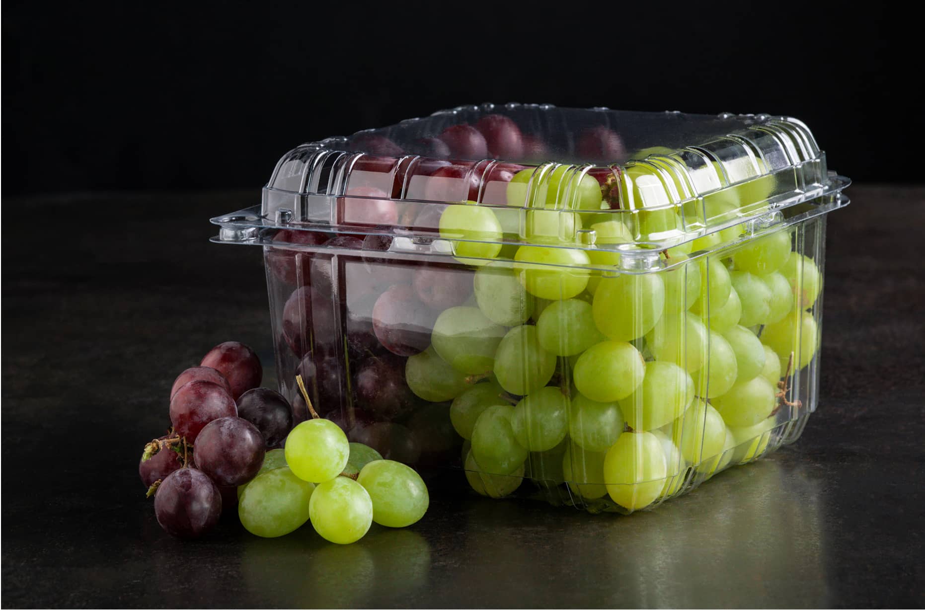 A large family sized Yucca Packaging punnet clamshell packed with grapes.
